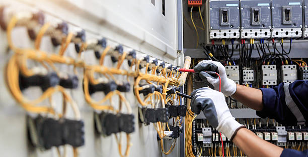 Professional Electrician technician working in Wareham Center, MA